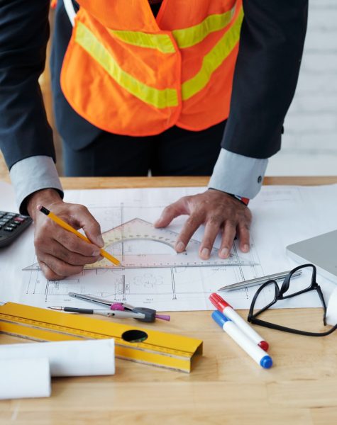 Cropped image of engineer drawing construction plan