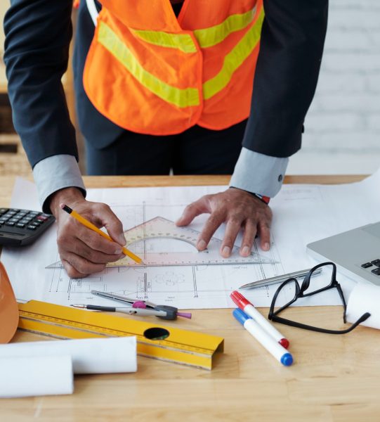 Cropped image of engineer drawing construction plan